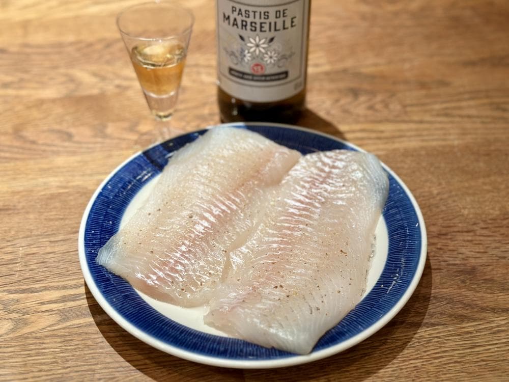 Kolja, flamberad med pastis
